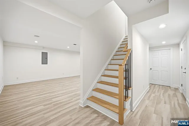 a view of entryway with wooden floor
