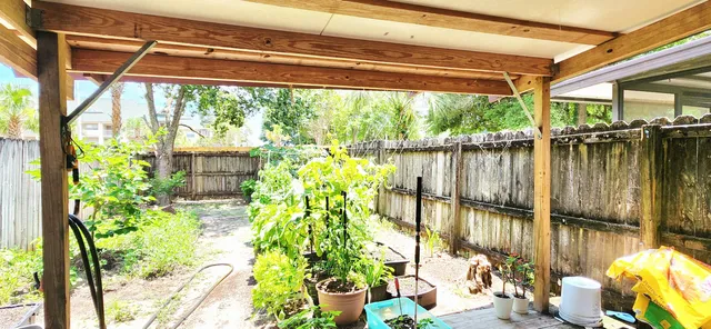 a view of a lake with a sitting area