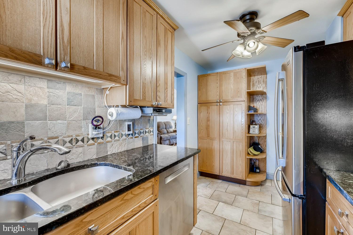 1734 Glen Ridge Road Towson, MD 21286 - Photo 13 of 32 Ceramic tile backsplash & floors