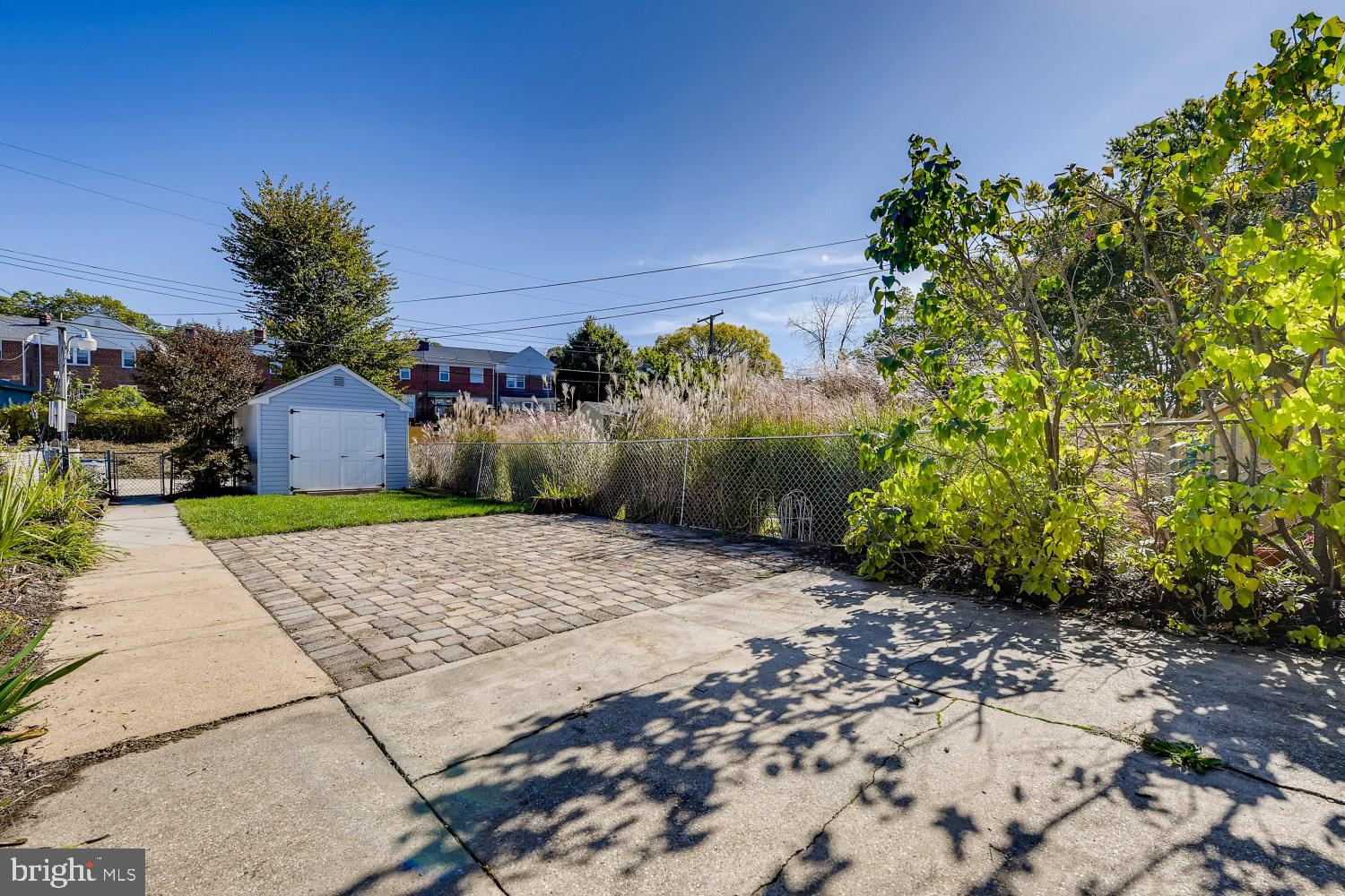1734 Glen Ridge Road Towson, MD 21286 - Photo 27 of 32 Concrete patio, then stone patio, then grass yard