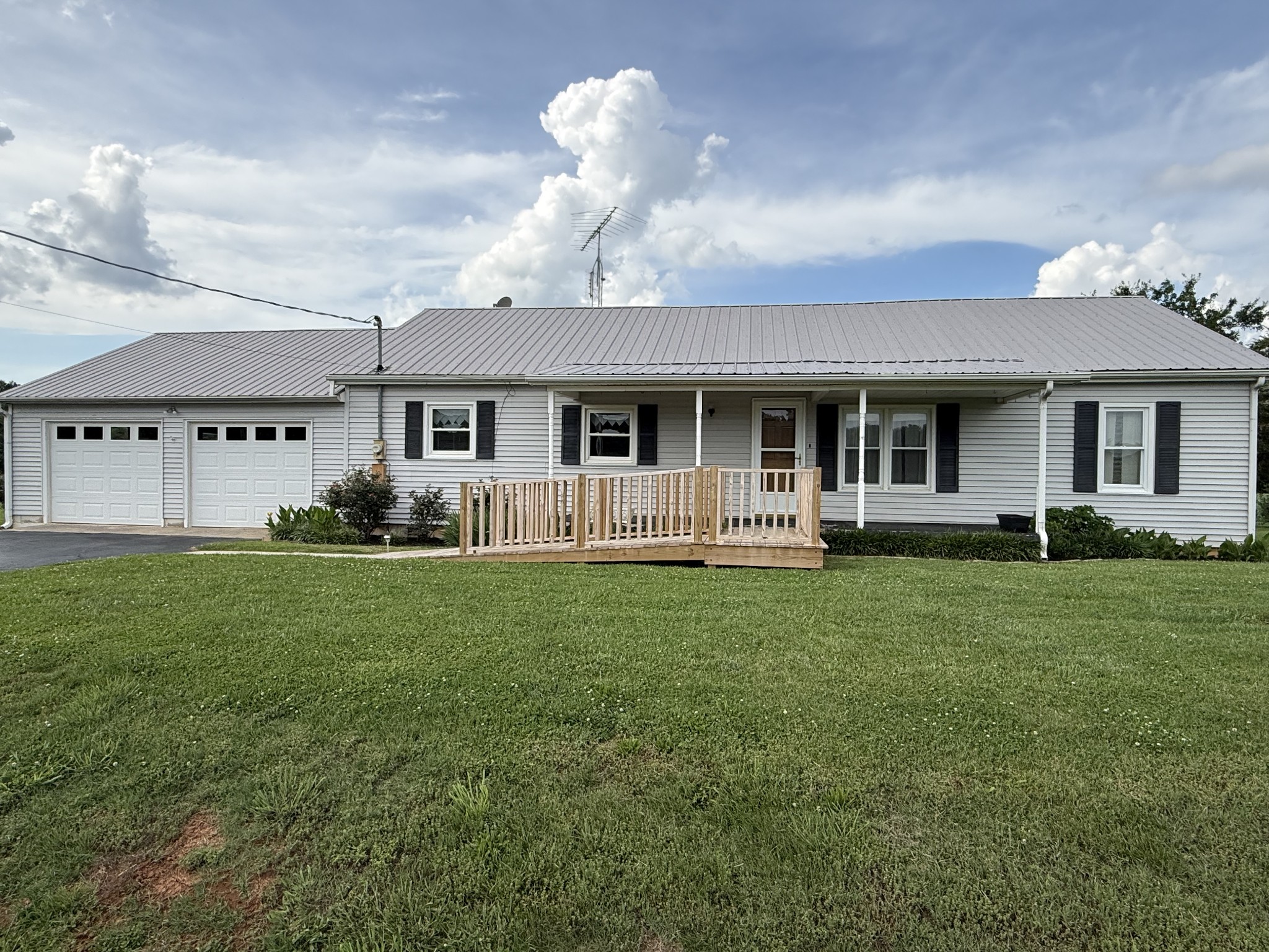 2971 Monroe Floyd Road Decherd, TN 37324 - Photo 1 of 26 a front view of a house with a yard