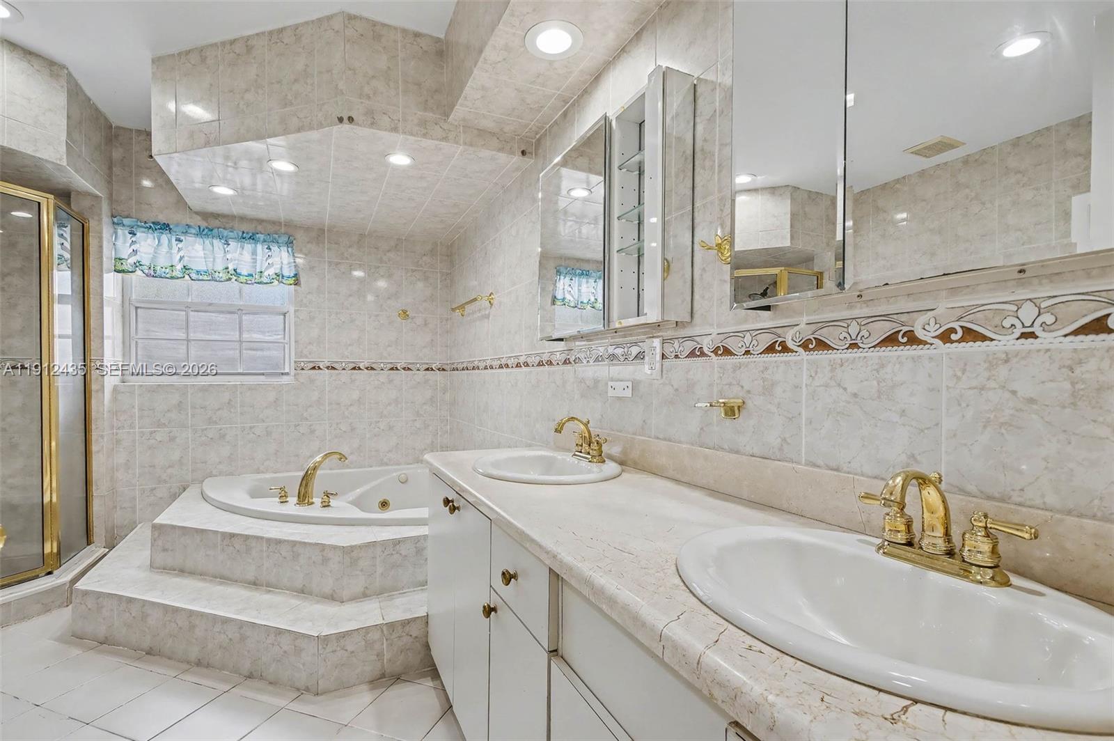 5936 Southwest 29th Street Miami, FL 33155 - Photo 16 of 32 a bathroom with a sink and a mirror