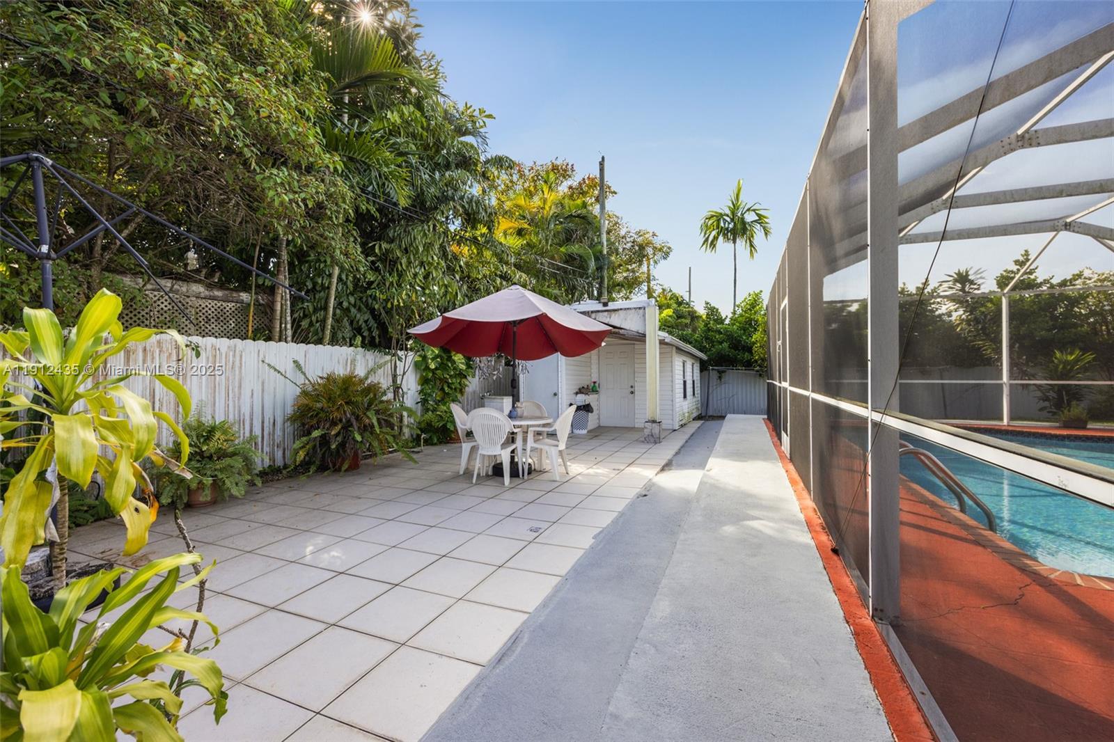 5936 Southwest 29th Street Miami, FL 33155 - Photo 5 of 8 a view of a chairs and table in the balcony