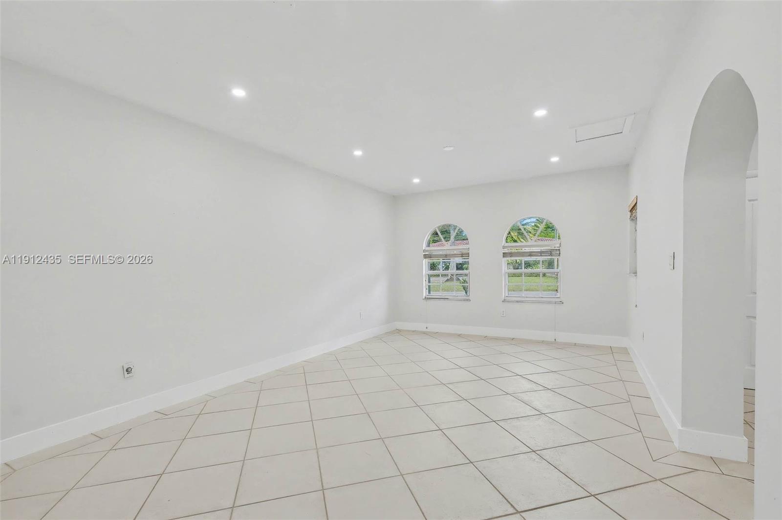 5936 Southwest 29th Street Miami, FL 33155 - Photo 7 of 32 an empty room with windows