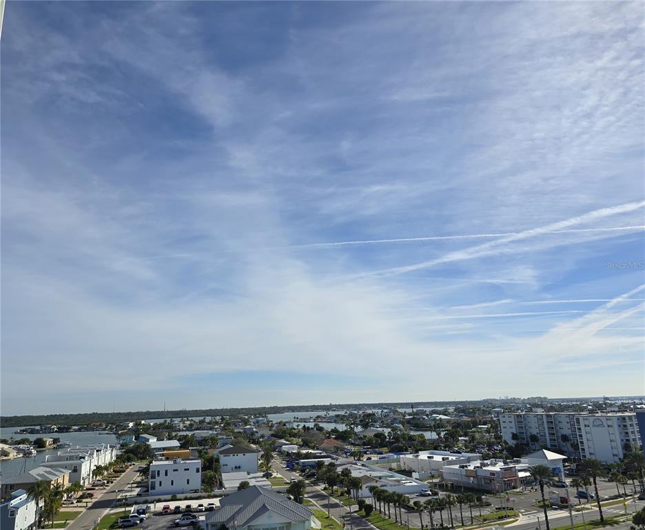 17408 Gulf Boulevard, Unit 1003 Redington Shores, FL 33708 - Photo 2 of 28 an aerial view of a city
