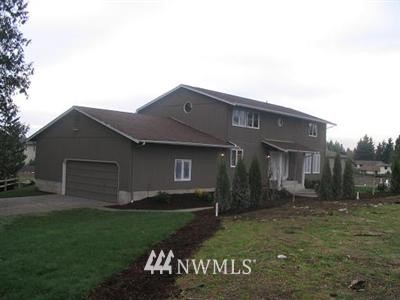 3202 172 Street Southeast Bothell, WA 98012 - Photo 1 of 1 a front view of a house with a garden
