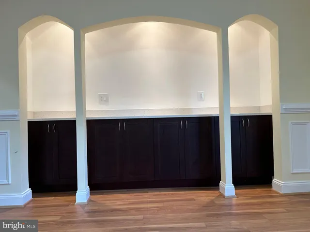 a kitchen with a sink and a microwave