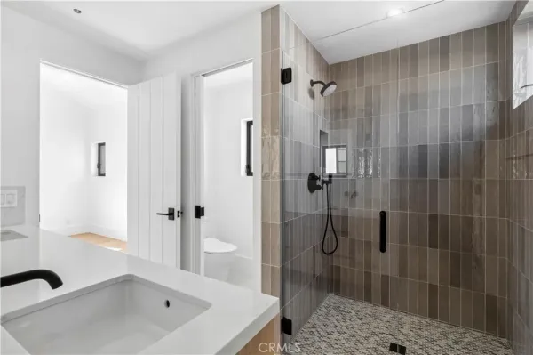 a bathroom with a shower and a bathtub