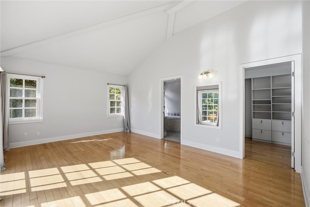 3513 May Street Los Angeles, CA 90066 - Photo 12 of 34 a view of an empty room with a window and wooden floor