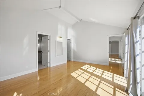 a view of livingroom with hardwood floor and a ceiling fan