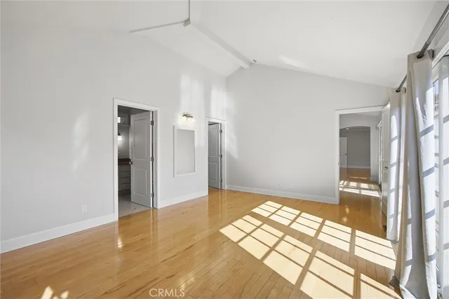 a view of livingroom with hardwood floor and a ceiling fan