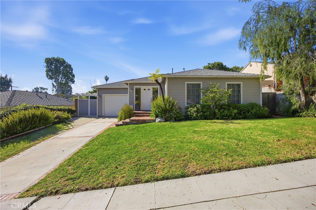 3513 May Street Los Angeles, CA 90066 - Photo 32 of 34 a front view of a house with garden