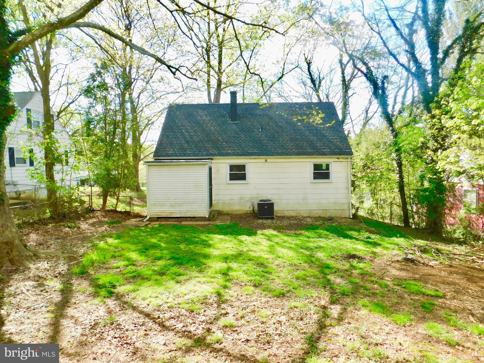 819 Templecliff Road Pikesville, MD 21208 - Photo 3 of 17 The rear of the house from the yard
