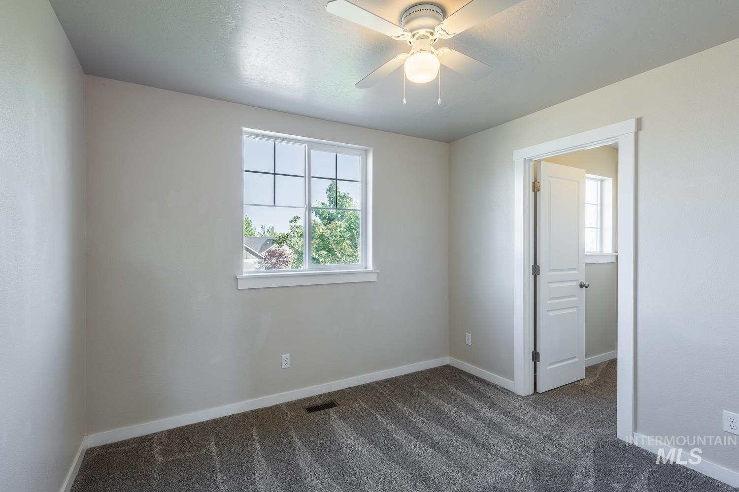 14253 Moreno Drive Caldwell, ID 83607 - Photo 32 of 48 Neutral tone wall finishes with crisp white trim details