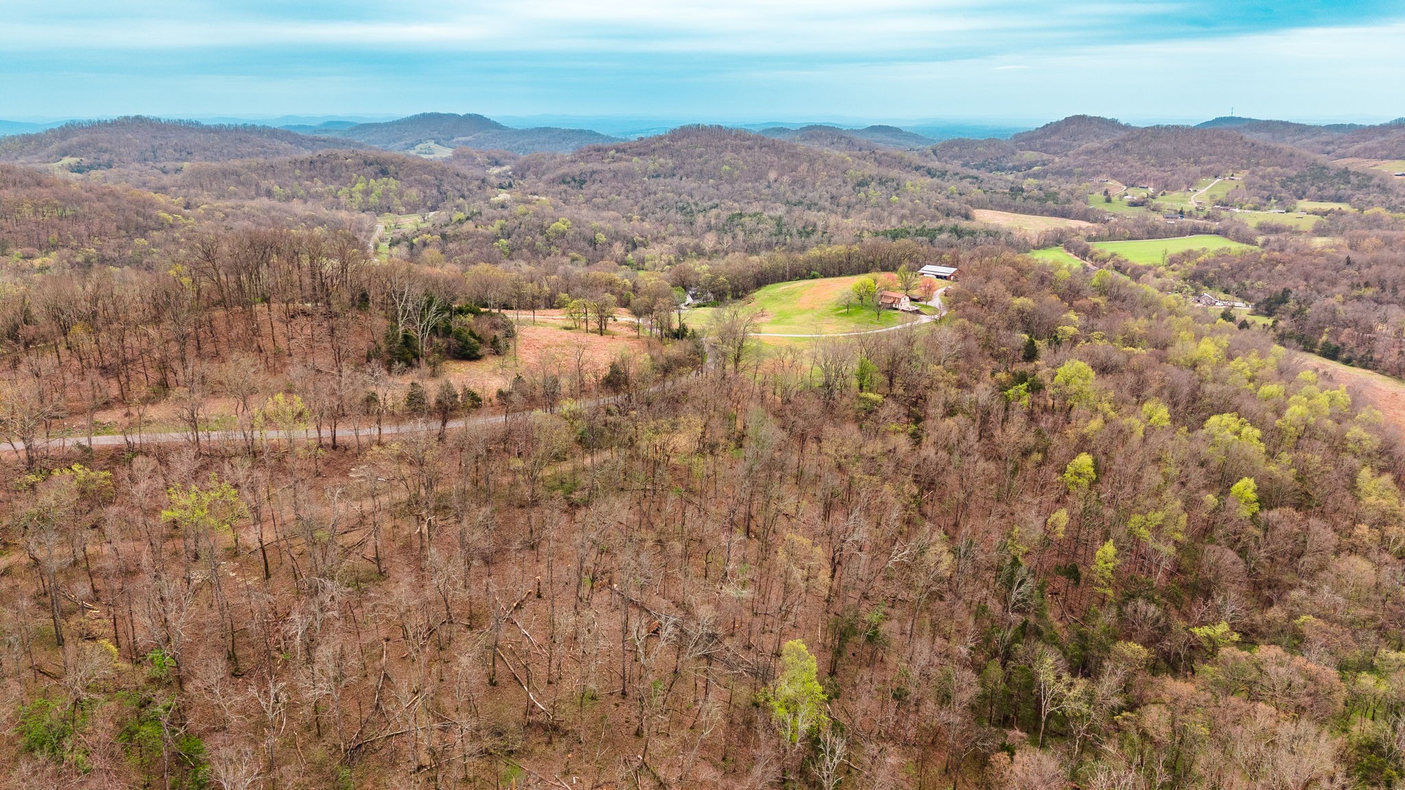0 Wolf Hill Road Bethpage, TN 37022 - Photo 11 of 46 an aerial view of residential houses with outdoor space and mountain view