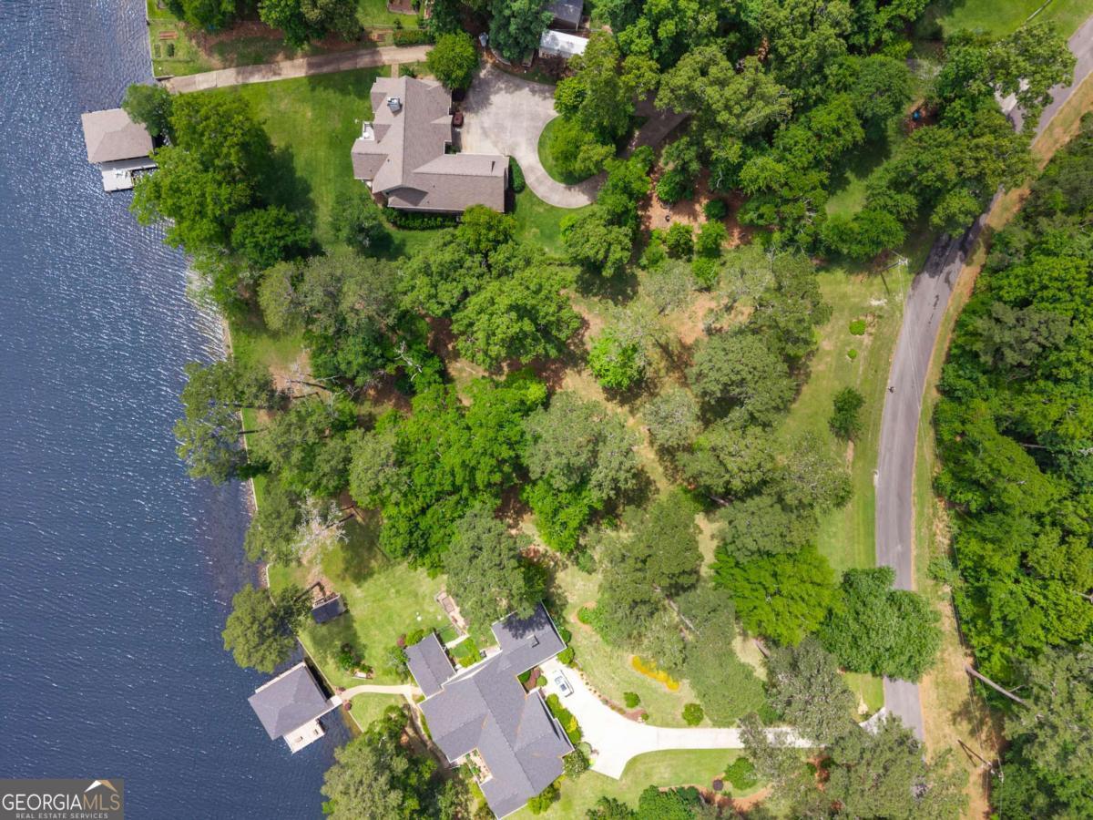 151 Bill Johnson Road Northeast Milledgeville, GA 31061 - Photo 23 of 27 an aerial view of a house with a yard