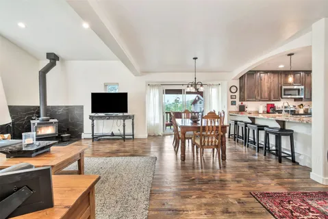 a view of a dining room with furniture