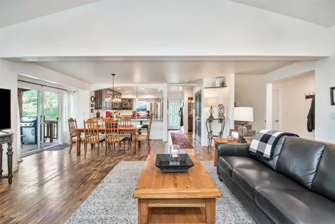 a view of a living room and dining room