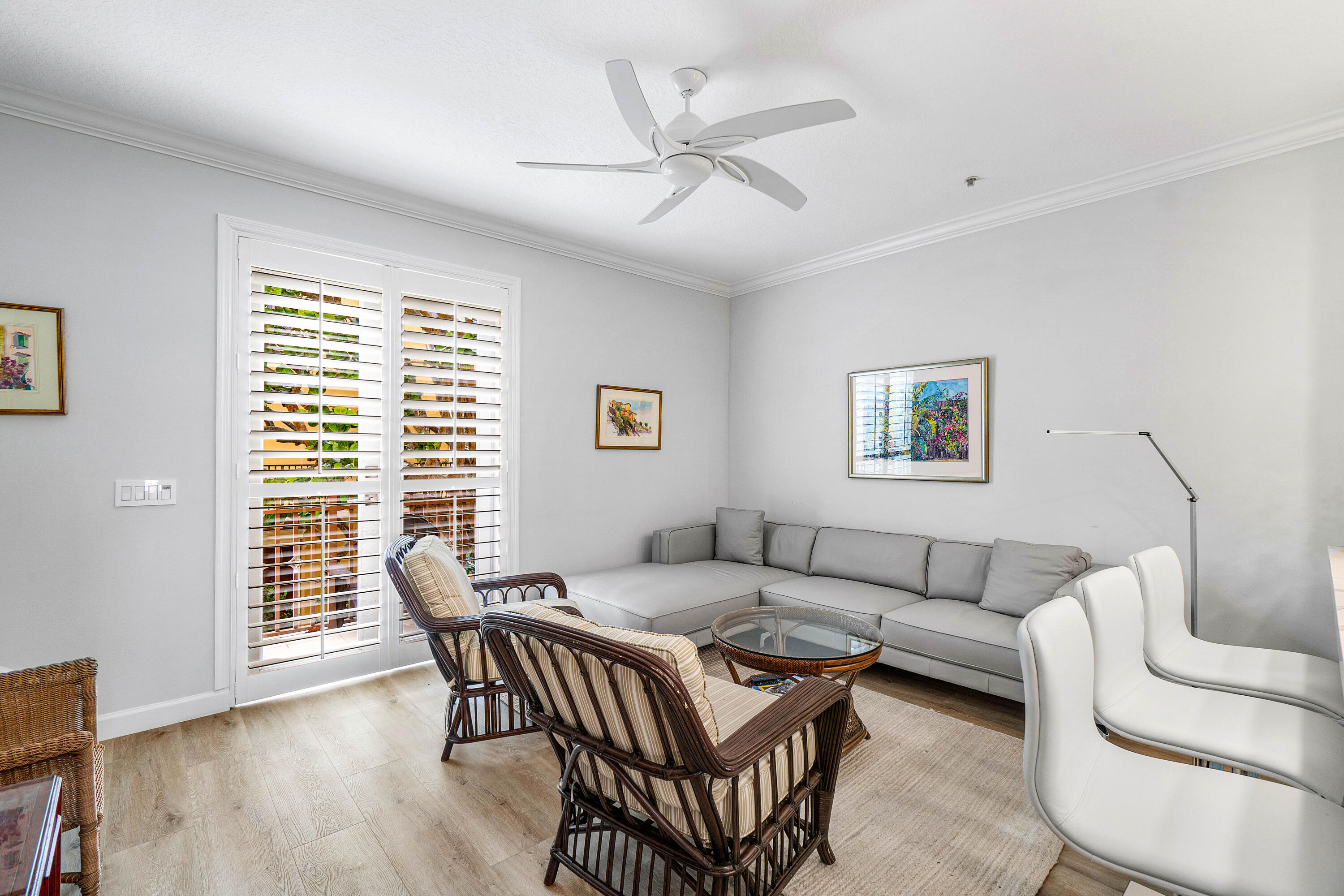 65 Southeast 5th Avenue, Unit B Delray Beach, FL 33483 - Photo 15 of 47 a living room with furniture and a large window
