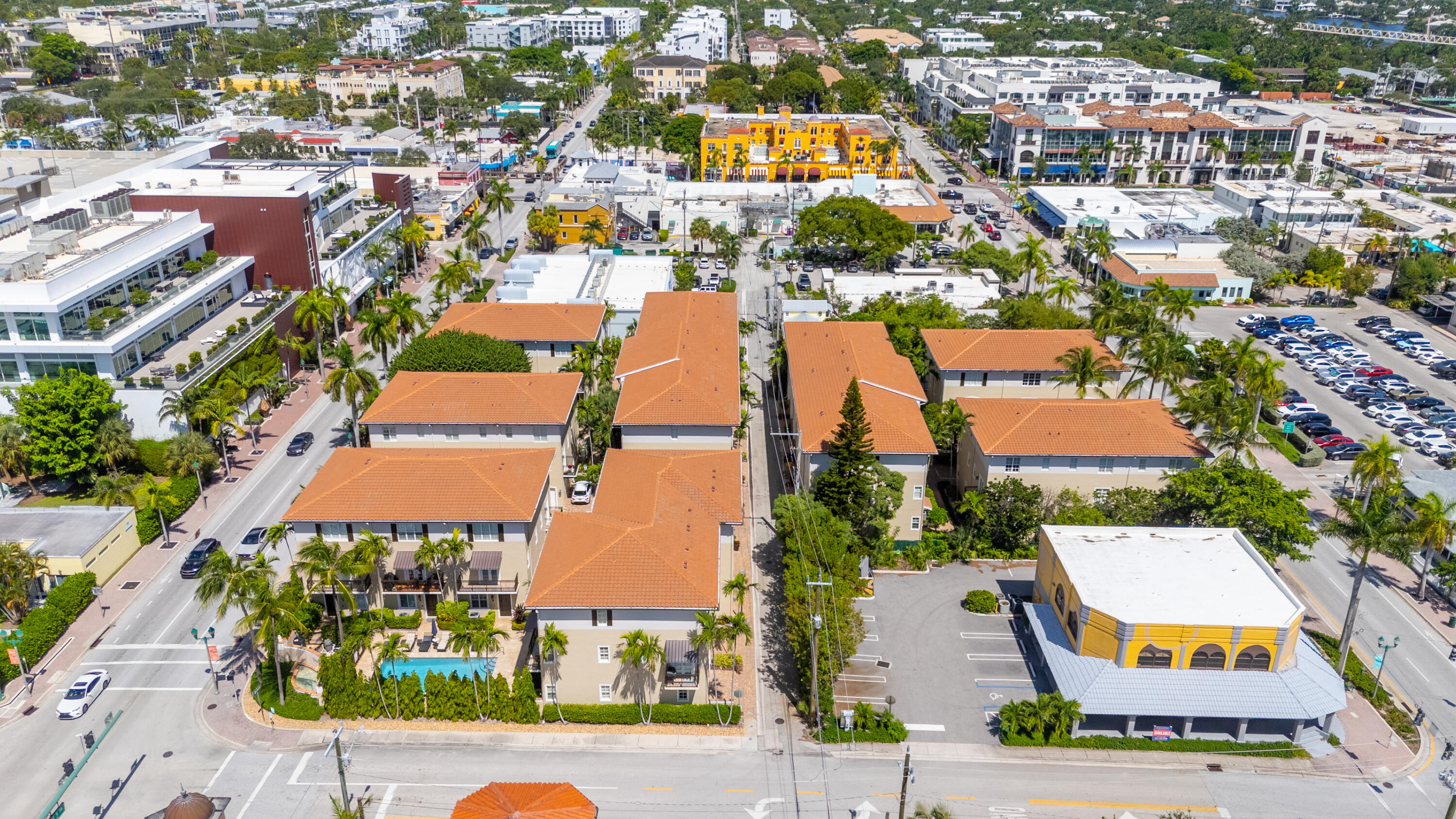 65 Southeast 5th Avenue, Unit B Delray Beach, FL 33483 - Photo 40 of 47 an aerial view of residential houses with outdoor space and swimming pool