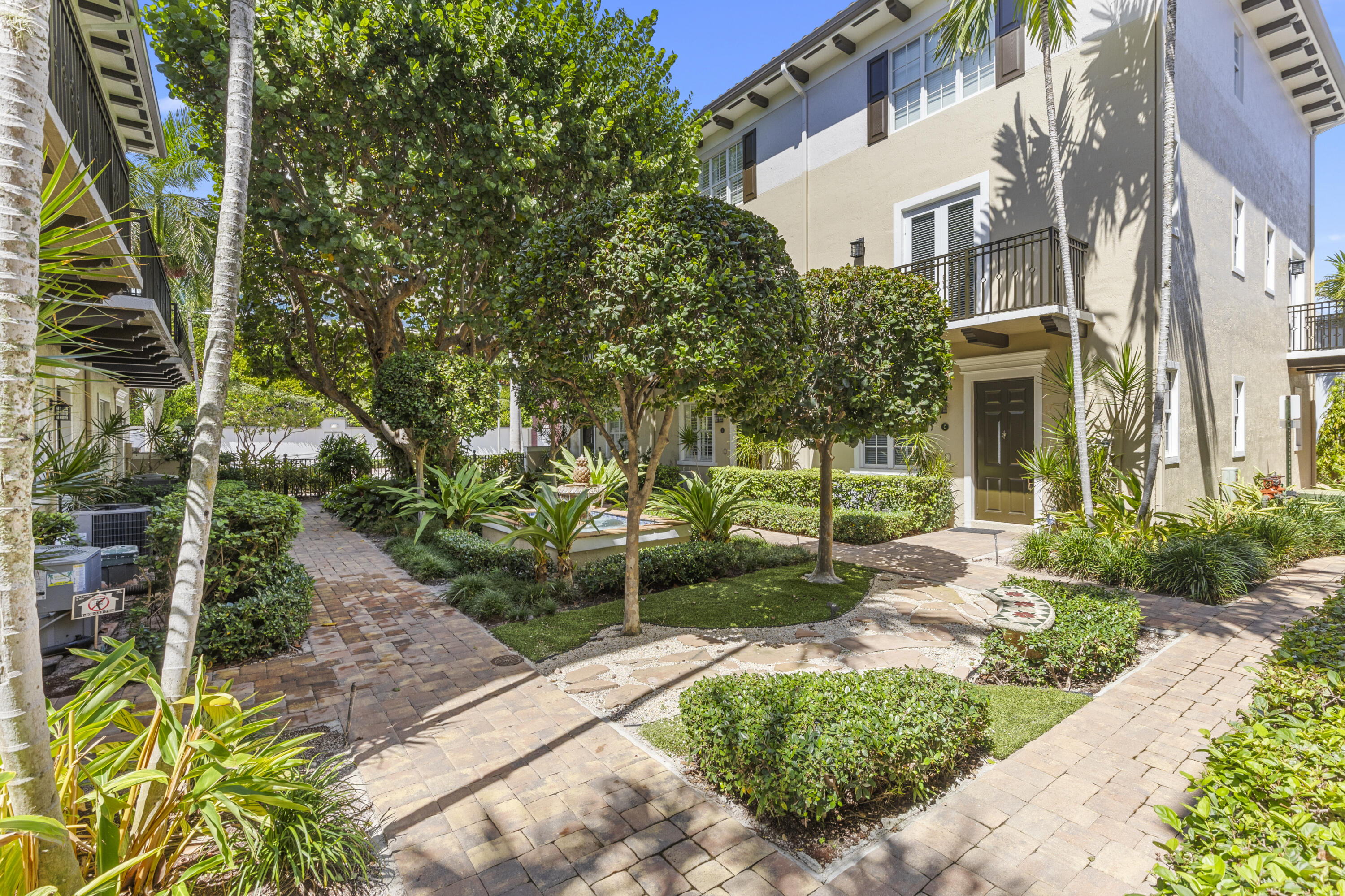 65 Southeast 5th Avenue, Unit B Delray Beach, FL 33483 - Photo 6 of 47 a view of a building with garden