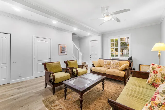 a kitchen with a stove a refrigerator and a sink