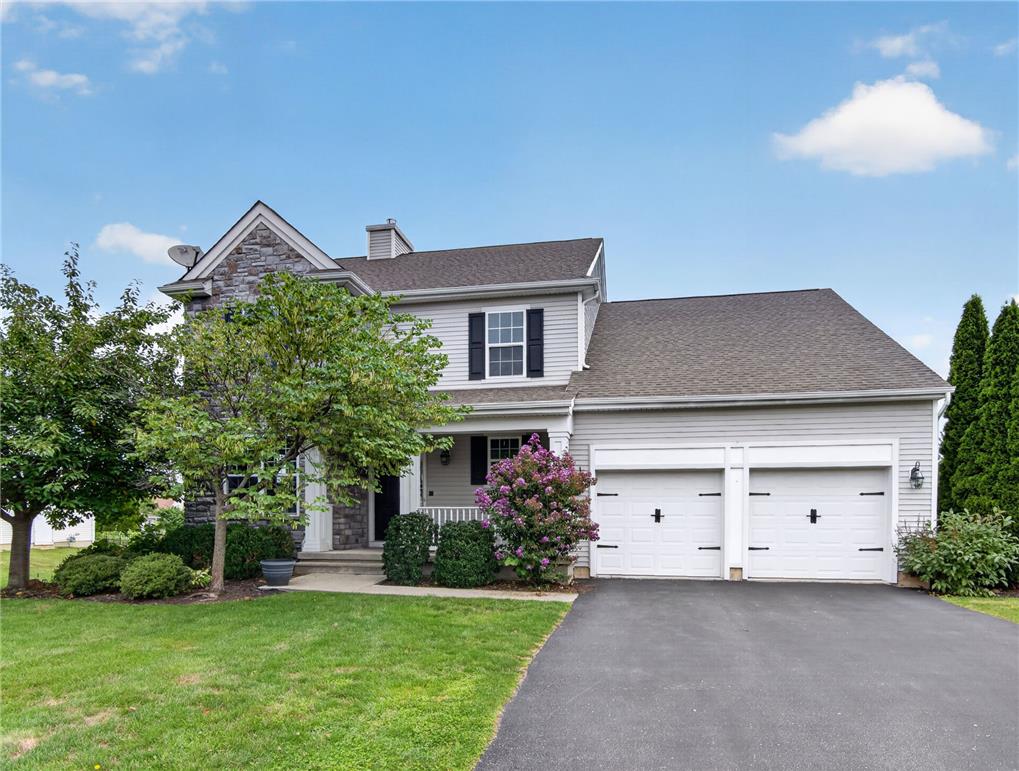 2765 Farmstead Road Easton, PA 18040 - Photo 47 of 50 Well-maintained curb appeal with a stone facade and double garage doors invites you home.