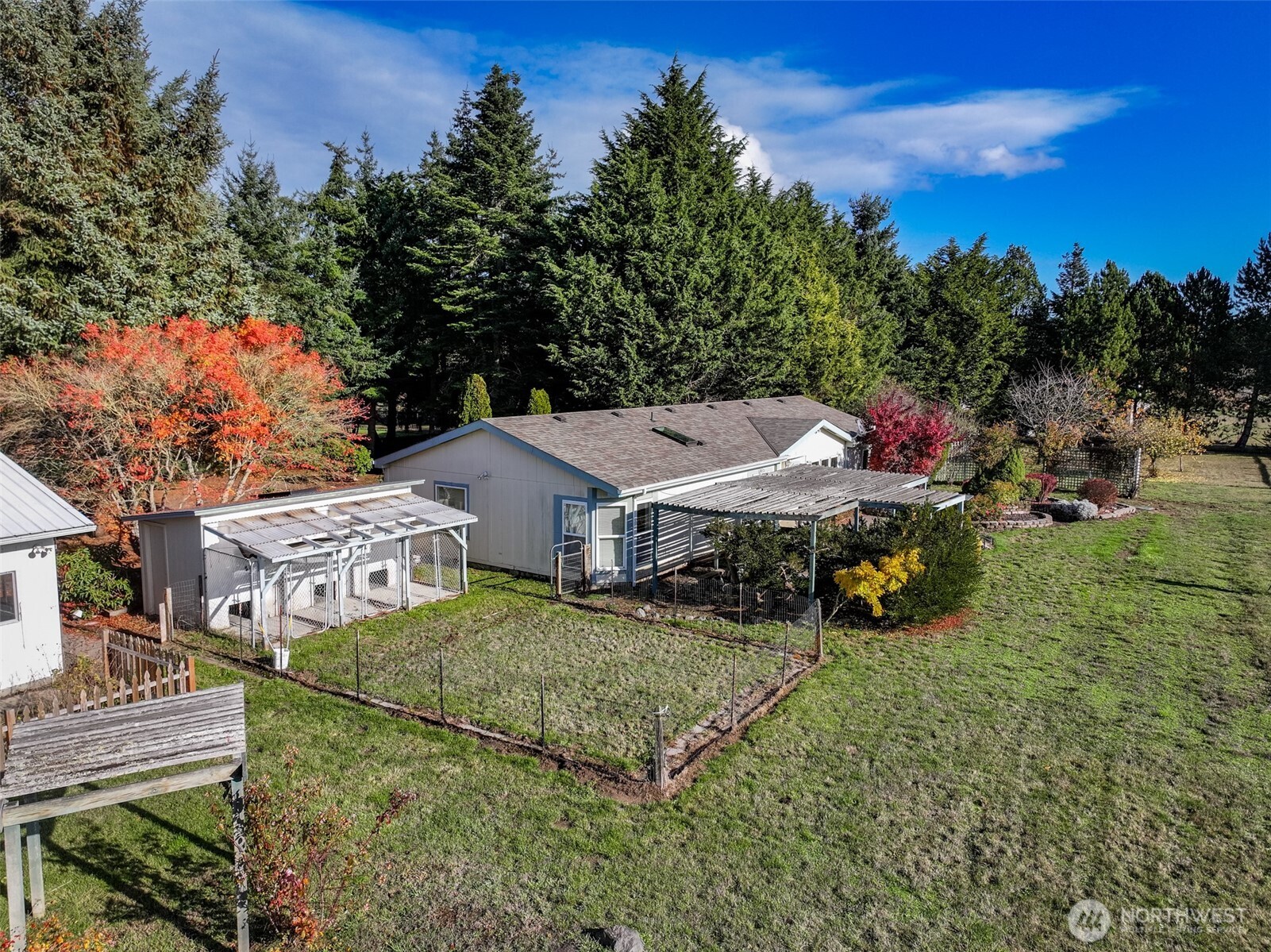 132 Cosmos Lane Port Angeles, WA 98362 - Photo 33 of 40 a view of a house with a yard
