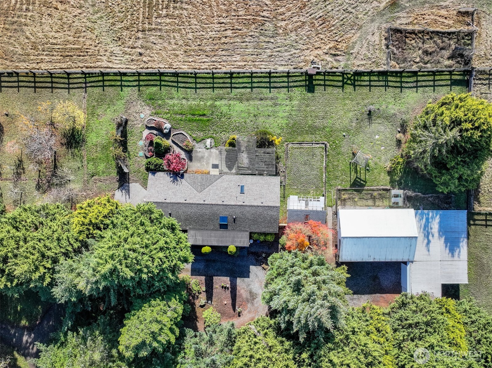 132 Cosmos Lane Port Angeles, WA 98362 - Photo 5 of 40 an aerial view of a house with a lake view