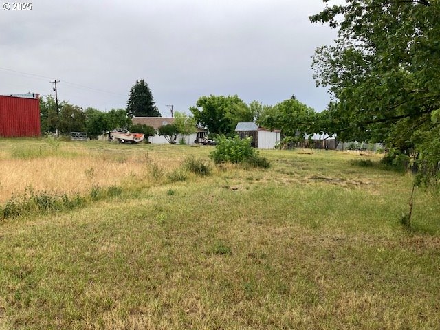 East Main Long Creek, OR 97856 - Photo 4 of 5 a view of a lake with houses