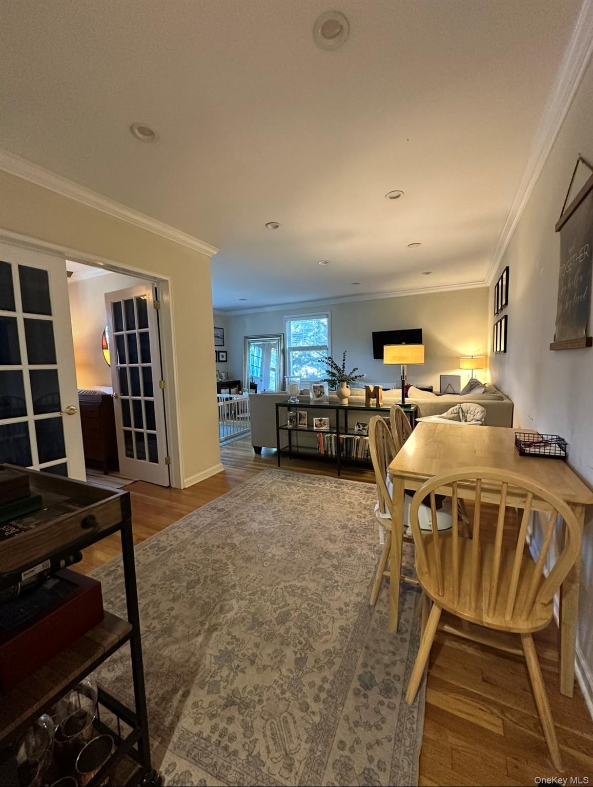 100 Cedar Street, Unit A21 Dobbs Ferry, NY 10522 - Photo 4 of 12 Dining room with crown molding, dark wood-style floors, and recessed lighting