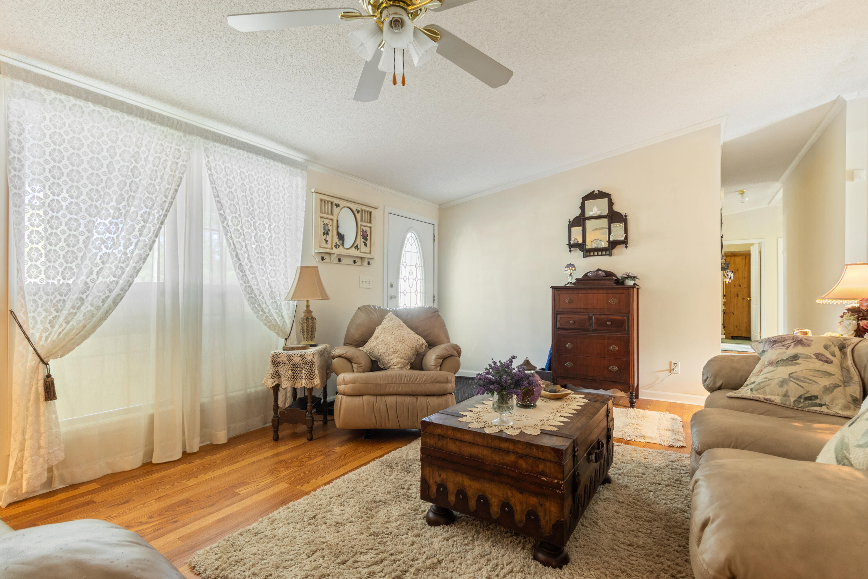387 Pope Street Freeport, FL 32439 - Photo 22 of 82 a living room with furniture and a large window