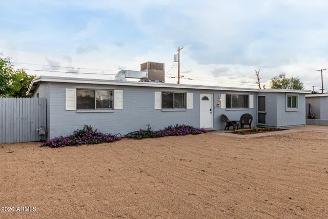 a view of a terrace with wooden fence