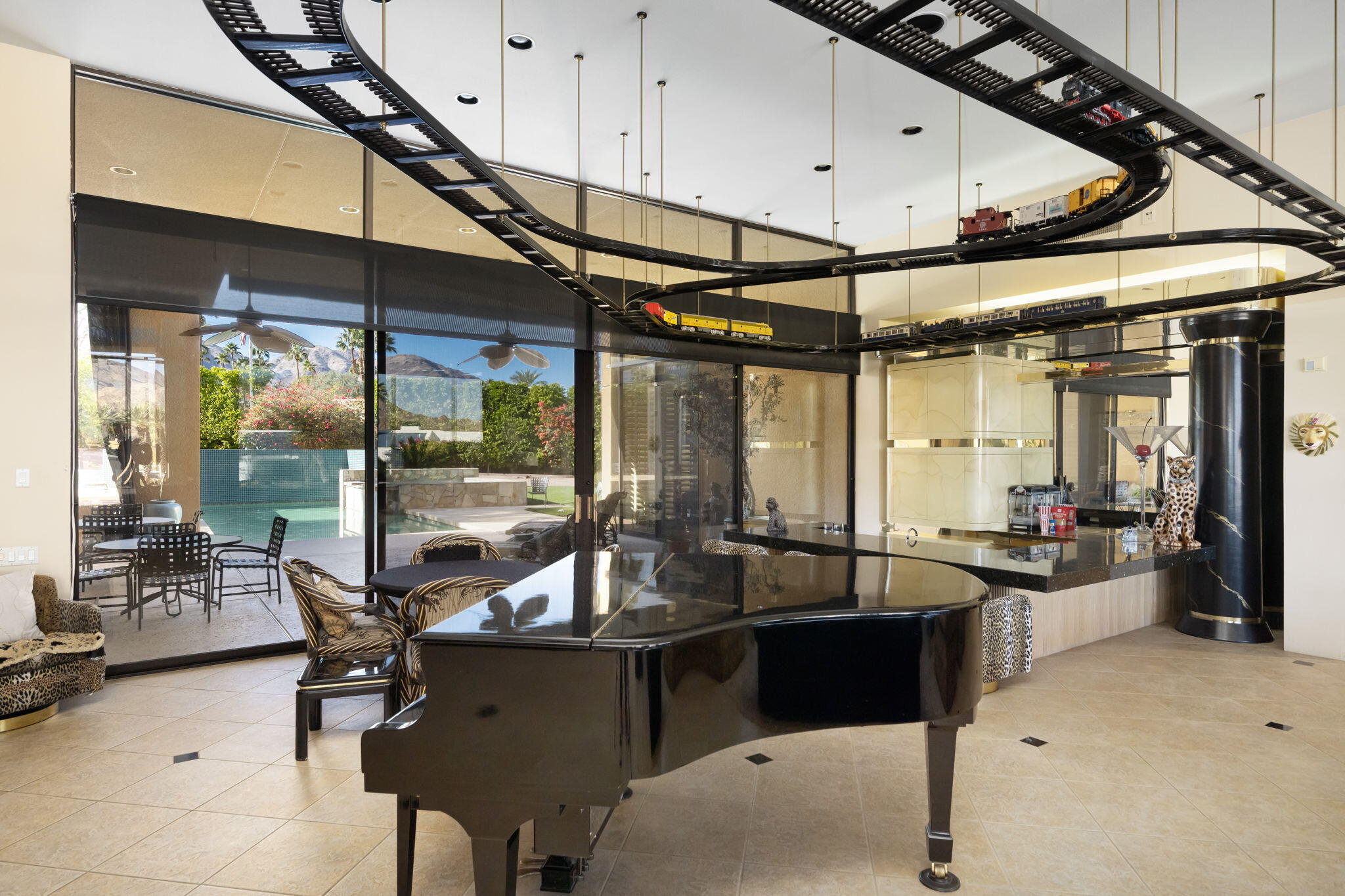 73380 Agave Lane Palm Desert, CA 92260 - Photo 12 of 81 a kitchen with a table chairs and wooden floor