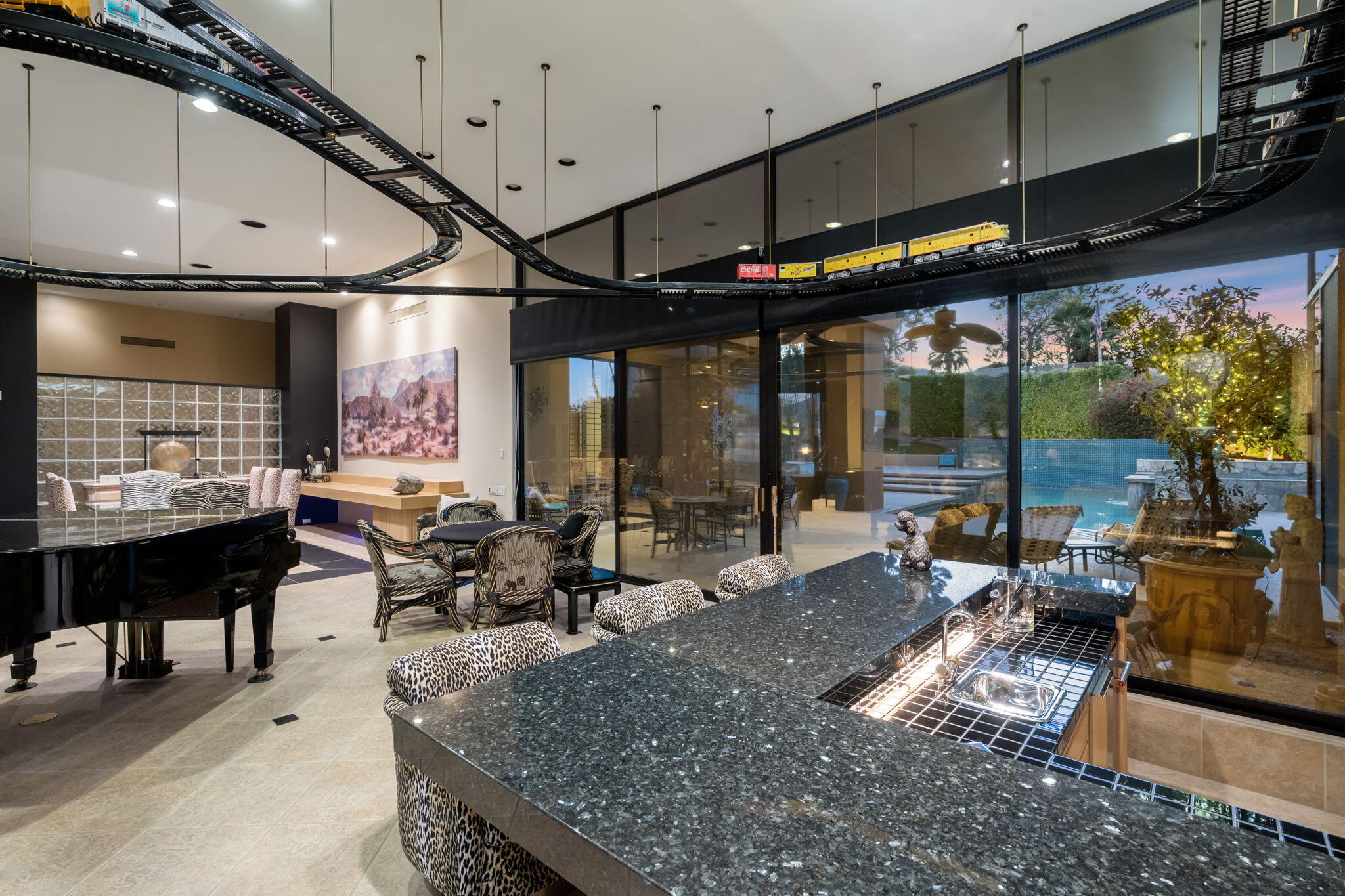 73380 Agave Lane Palm Desert, CA 92260 - Photo 17 of 81 a living room with lots of furniture and a large window
