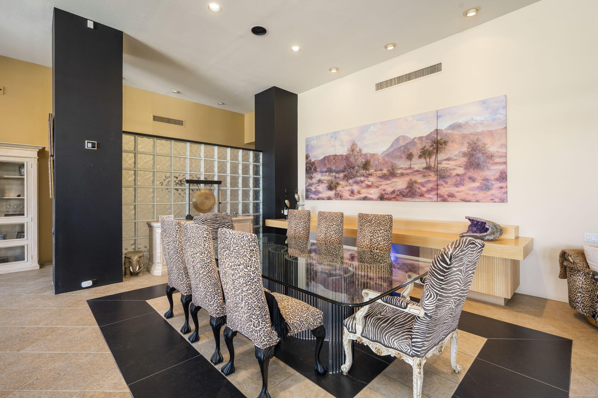73380 Agave Lane Palm Desert, CA 92260 - Photo 20 of 81 a view of a dining room with furniture and wooden floor