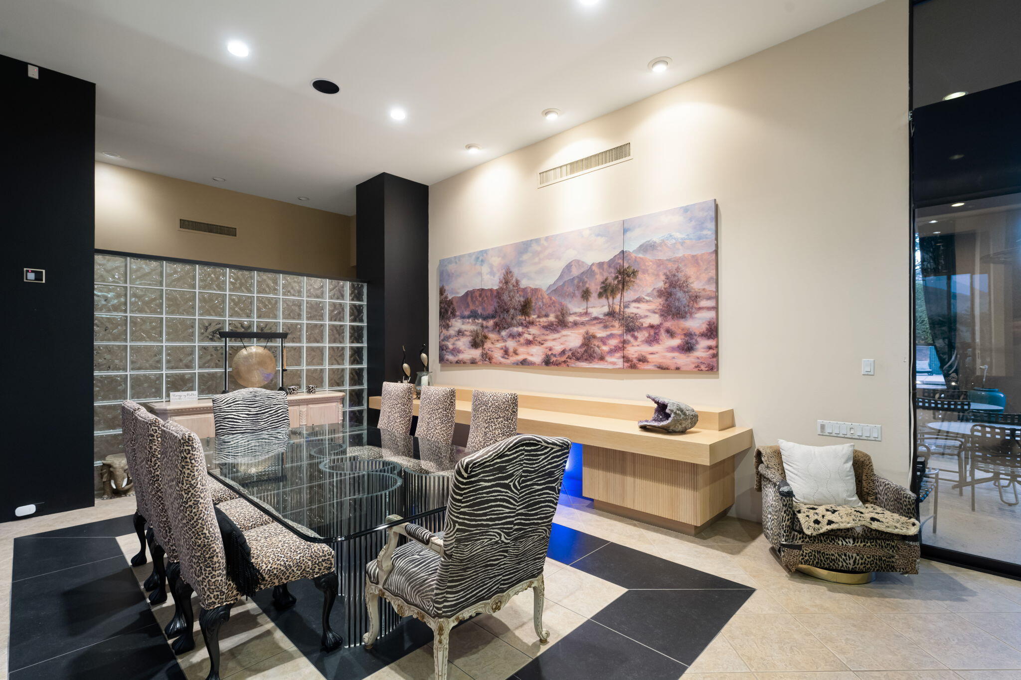 73380 Agave Lane Palm Desert, CA 92260 - Photo 22 of 81 a dining room with furniture and a floor to ceiling window