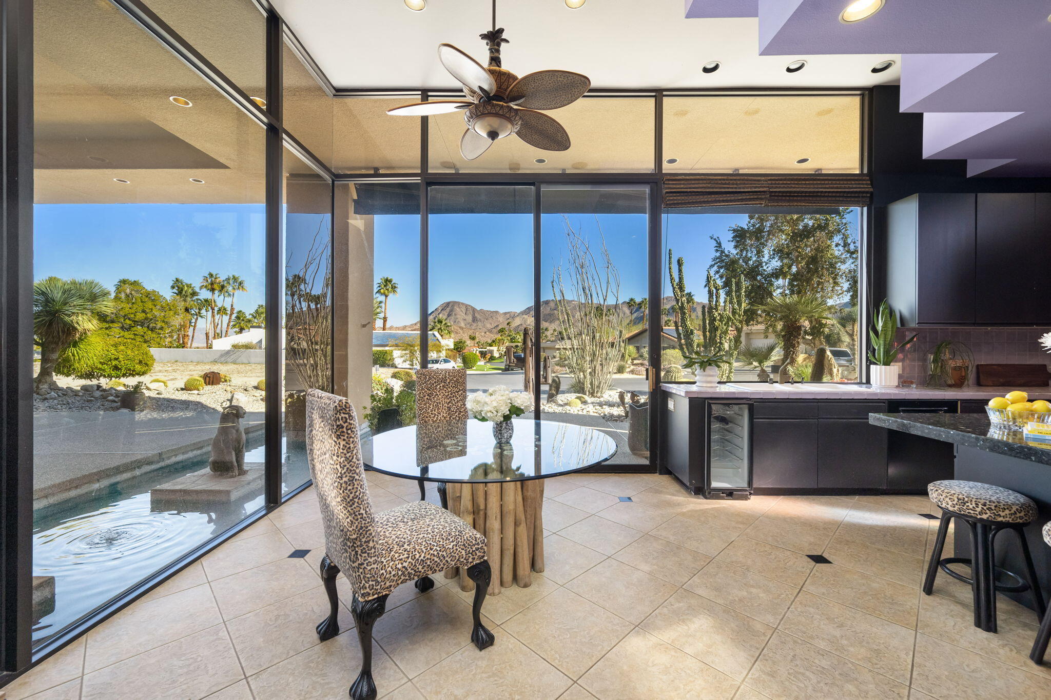 73380 Agave Lane Palm Desert, CA 92260 - Photo 27 of 81 a dining room with furniture and a window