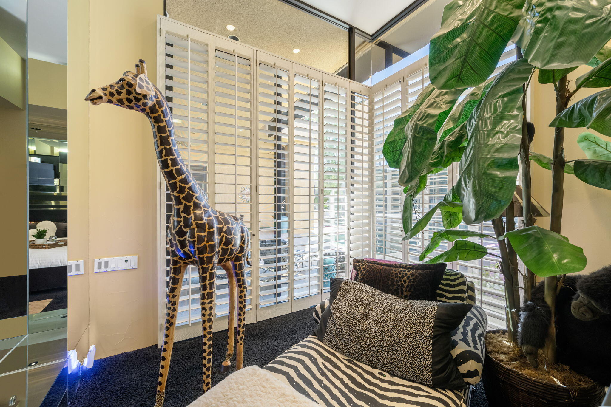 73380 Agave Lane Palm Desert, CA 92260 - Photo 30 of 81 a living room with furniture and a potted plant