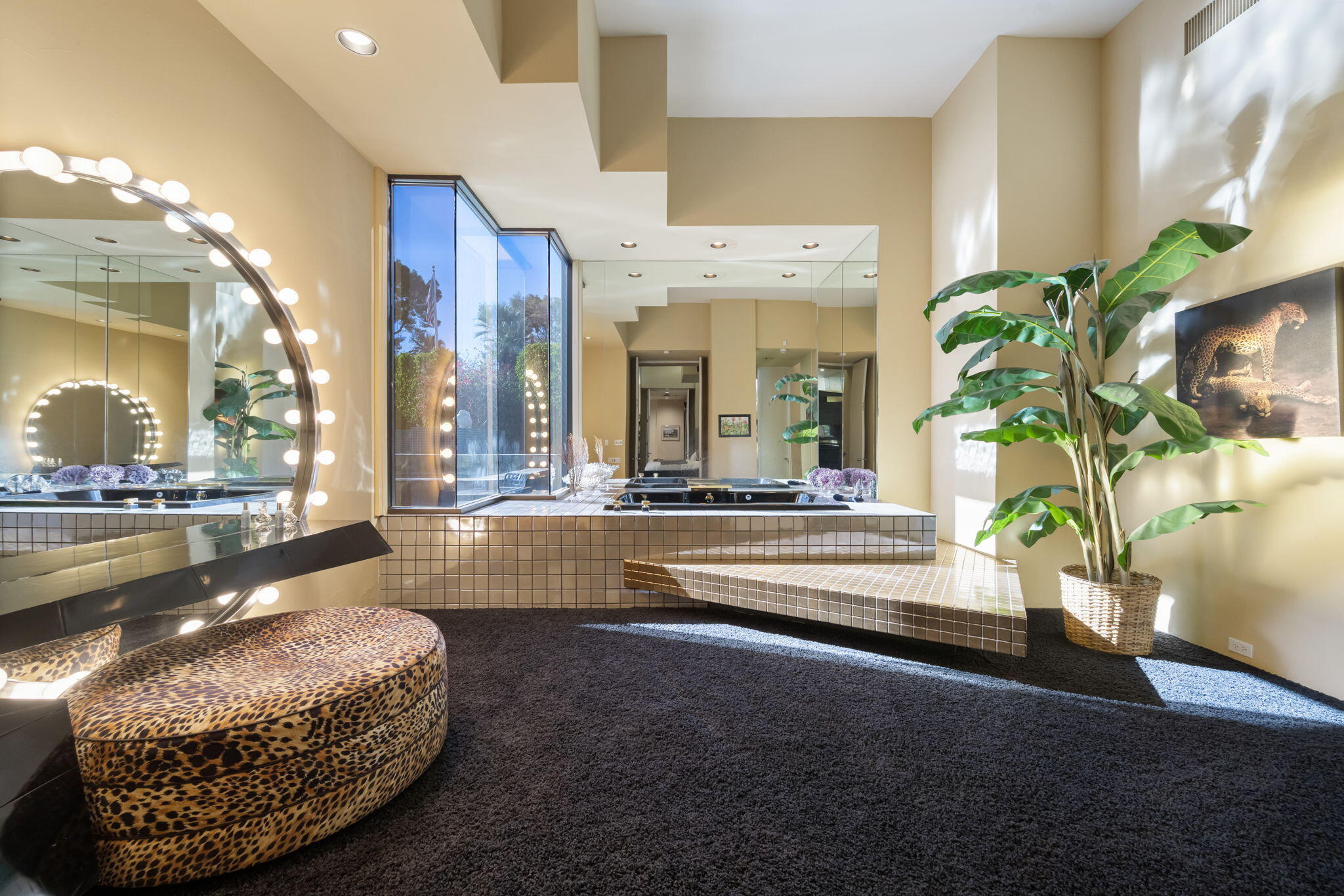 73380 Agave Lane Palm Desert, CA 92260 - Photo 31 of 81 a bathroom with a bathtub and a potted plant