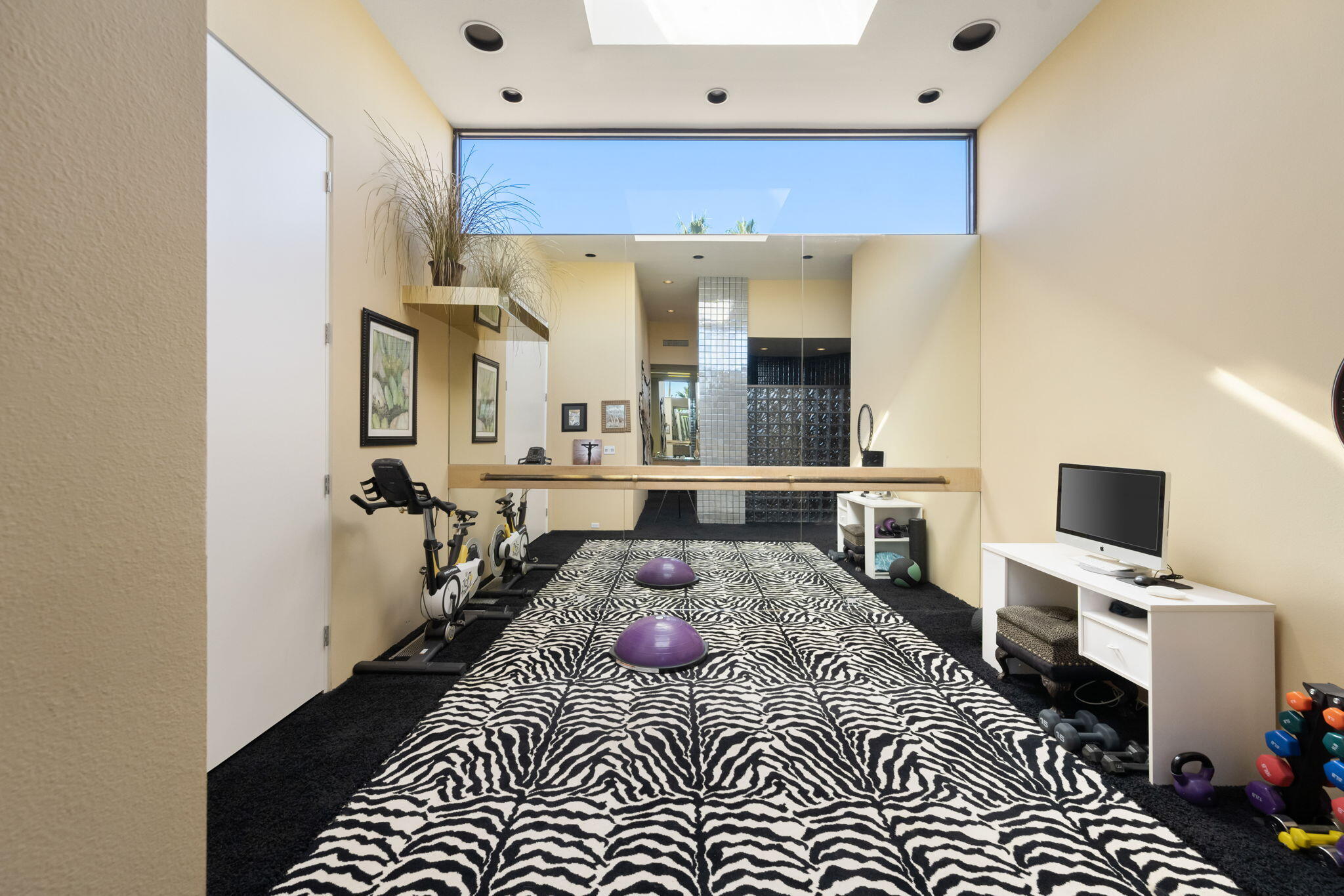 73380 Agave Lane Palm Desert, CA 92260 - Photo 37 of 81 a bedroom with a bed and wooden floor