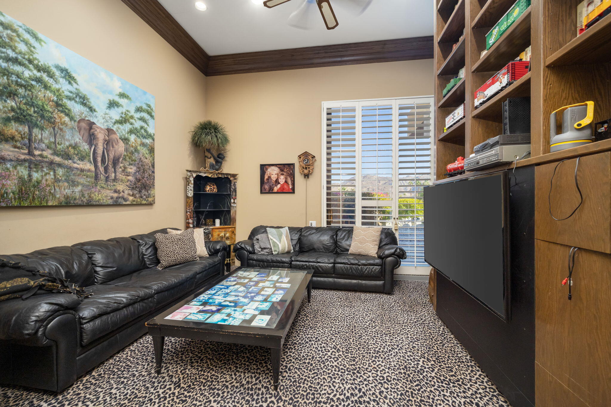 73380 Agave Lane Palm Desert, CA 92260 - Photo 40 of 81 a living room with furniture and a window