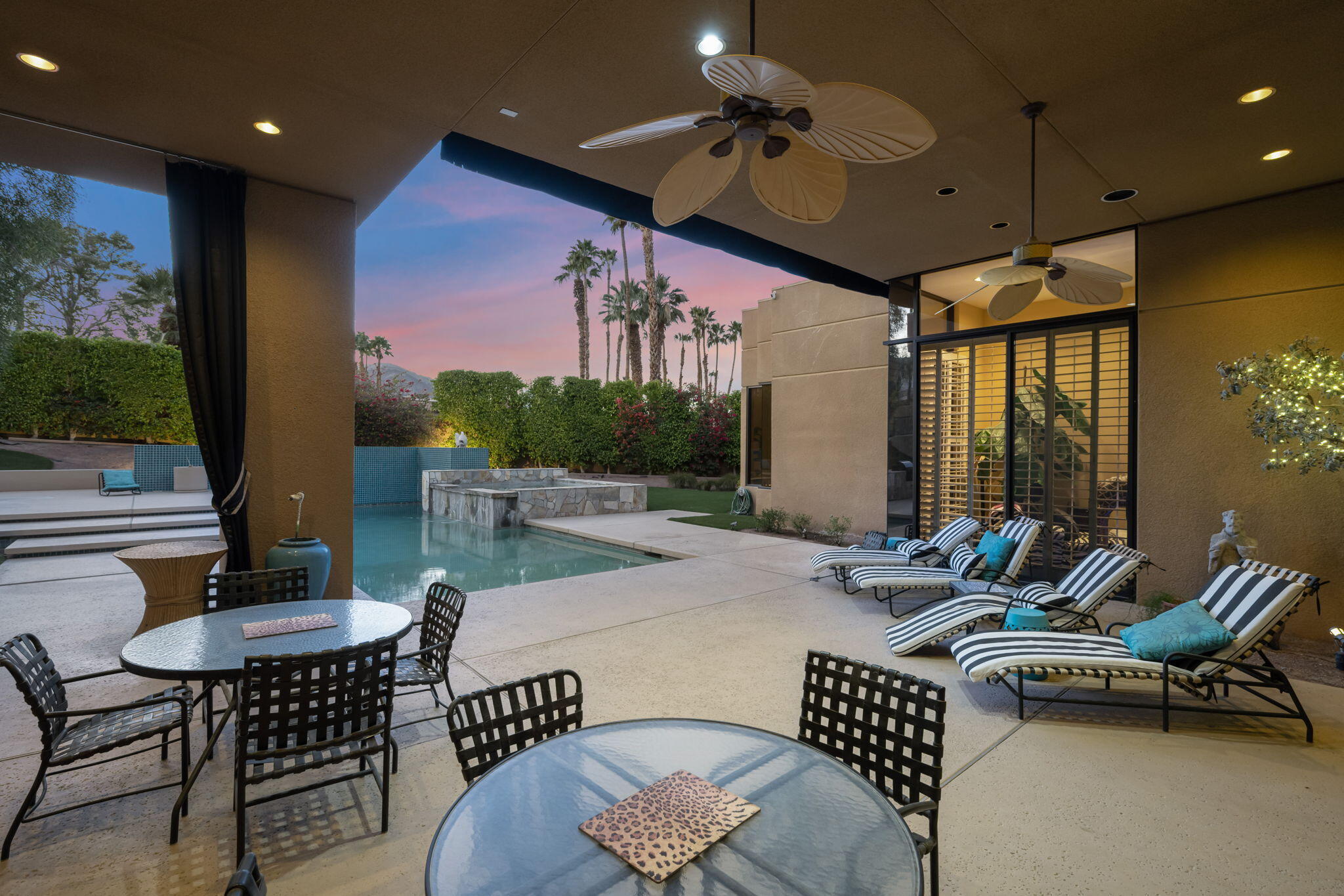 73380 Agave Lane Palm Desert, CA 92260 - Photo 51 of 81 a outdoor dining space with furniture