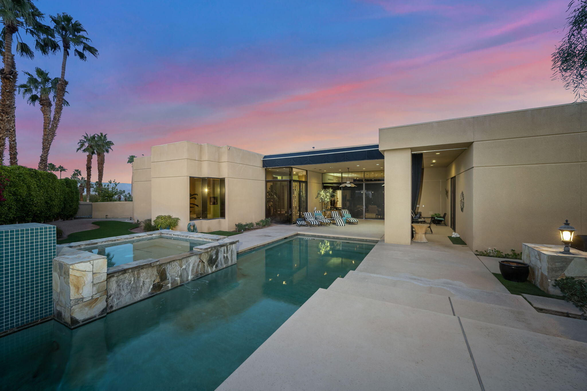 73380 Agave Lane Palm Desert, CA 92260 - Photo 55 of 81 a view of a house with backyard porch and sitting area