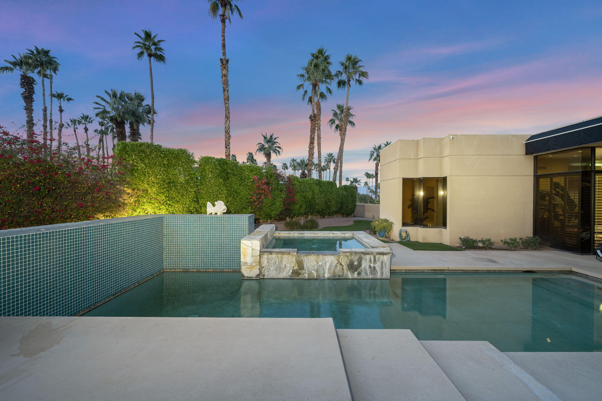 73380 Agave Lane Palm Desert, CA 92260 - Photo 56 of 81 a view of a swimming pool with a patio