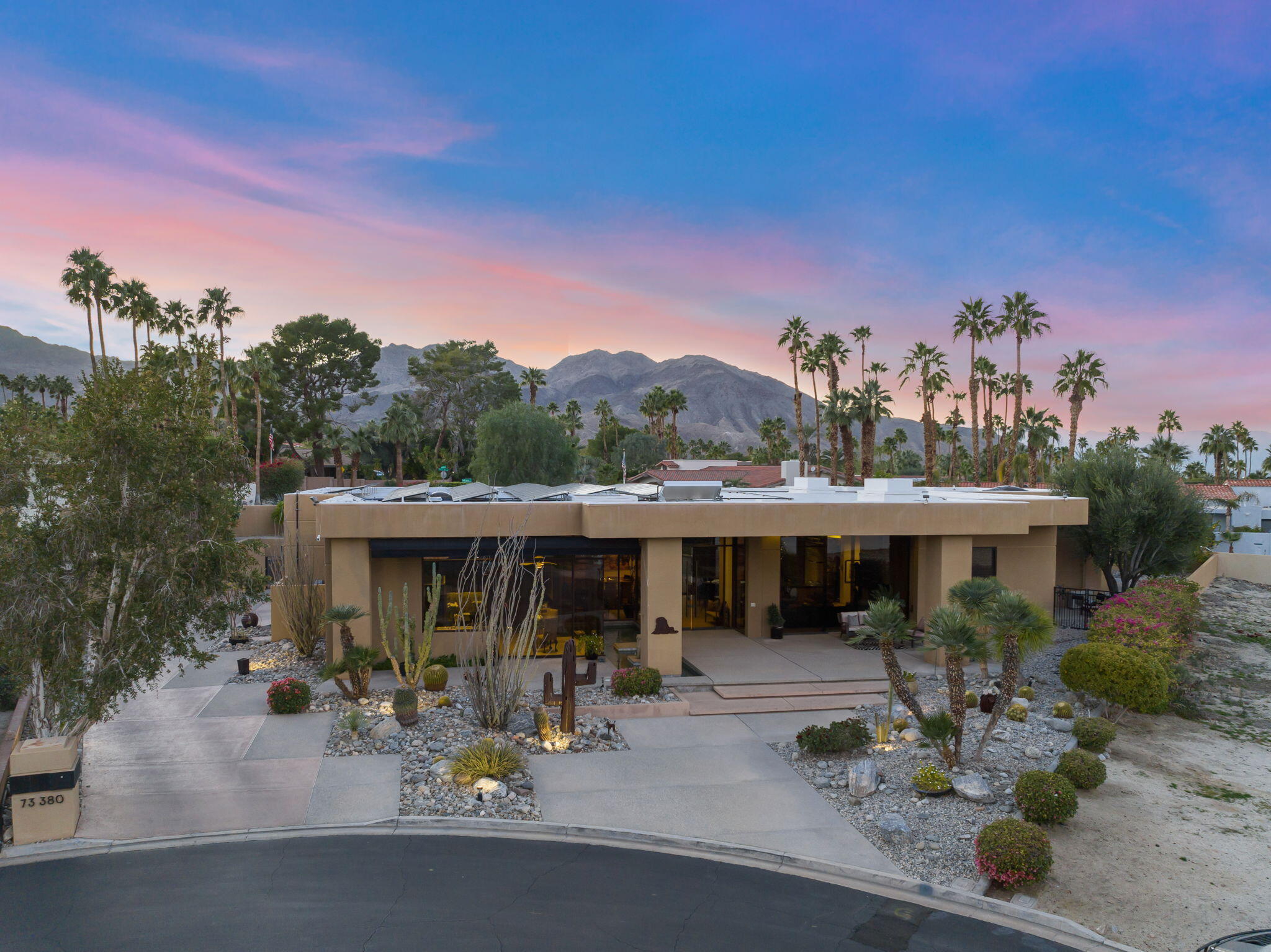 73380 Agave Lane Palm Desert, CA 92260 - Photo 6 of 81 a view of a house with sitting area and garden