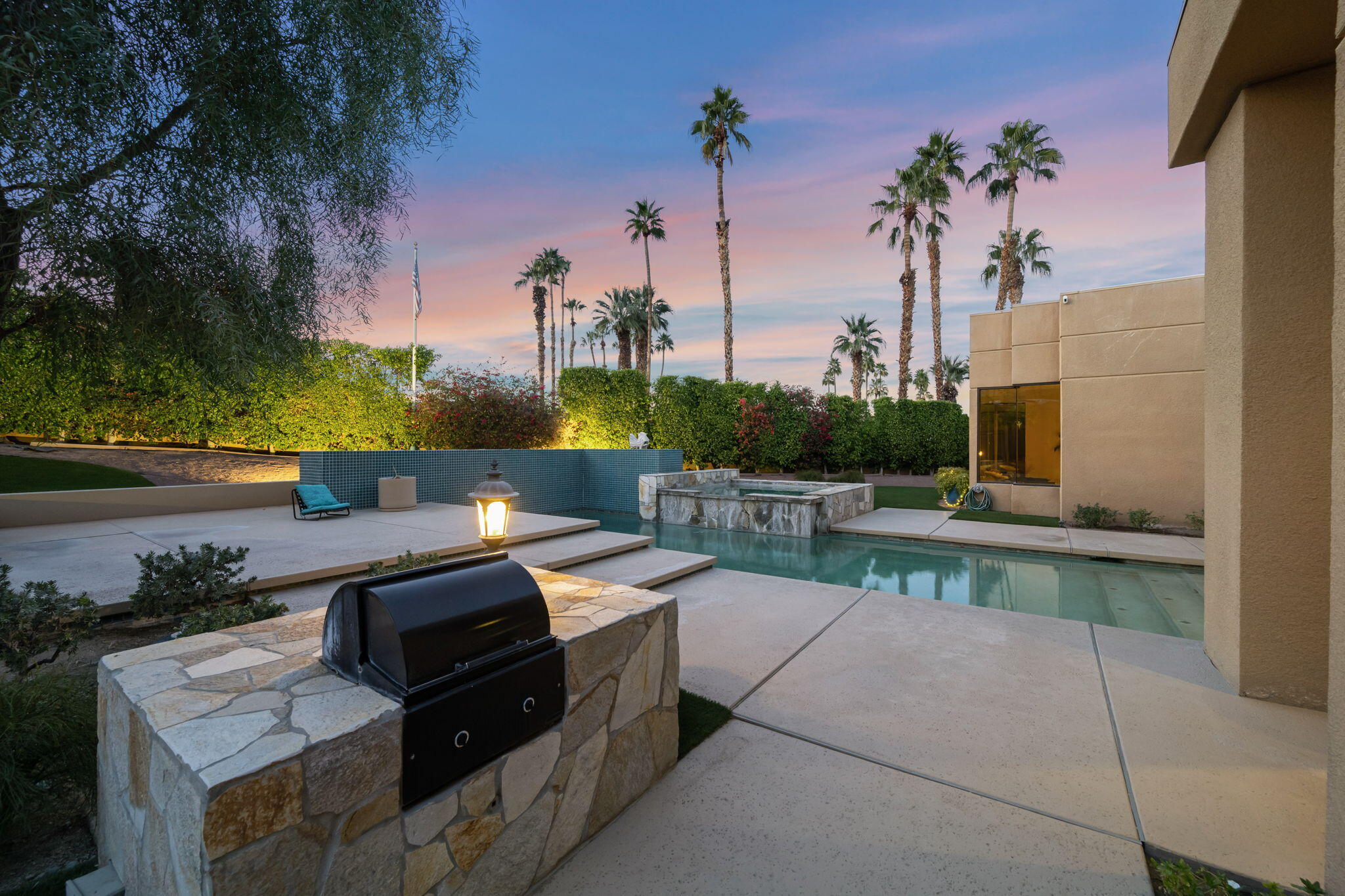 73380 Agave Lane Palm Desert, CA 92260 - Photo 61 of 81 a view of a patio with couches and potted plants