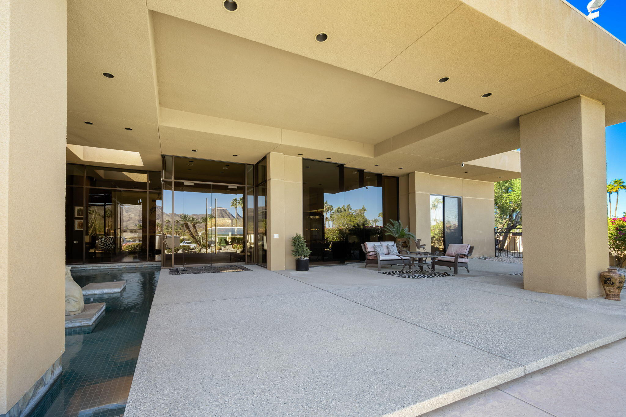 73380 Agave Lane Palm Desert, CA 92260 - Photo 66 of 81 a view of a livingroom with furniture and a window