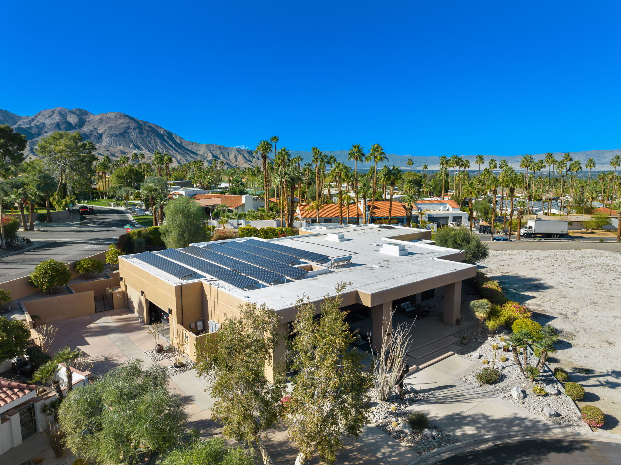 73380 Agave Lane Palm Desert, CA 92260 - Photo 69 of 81 a view of a patio with swimming pool