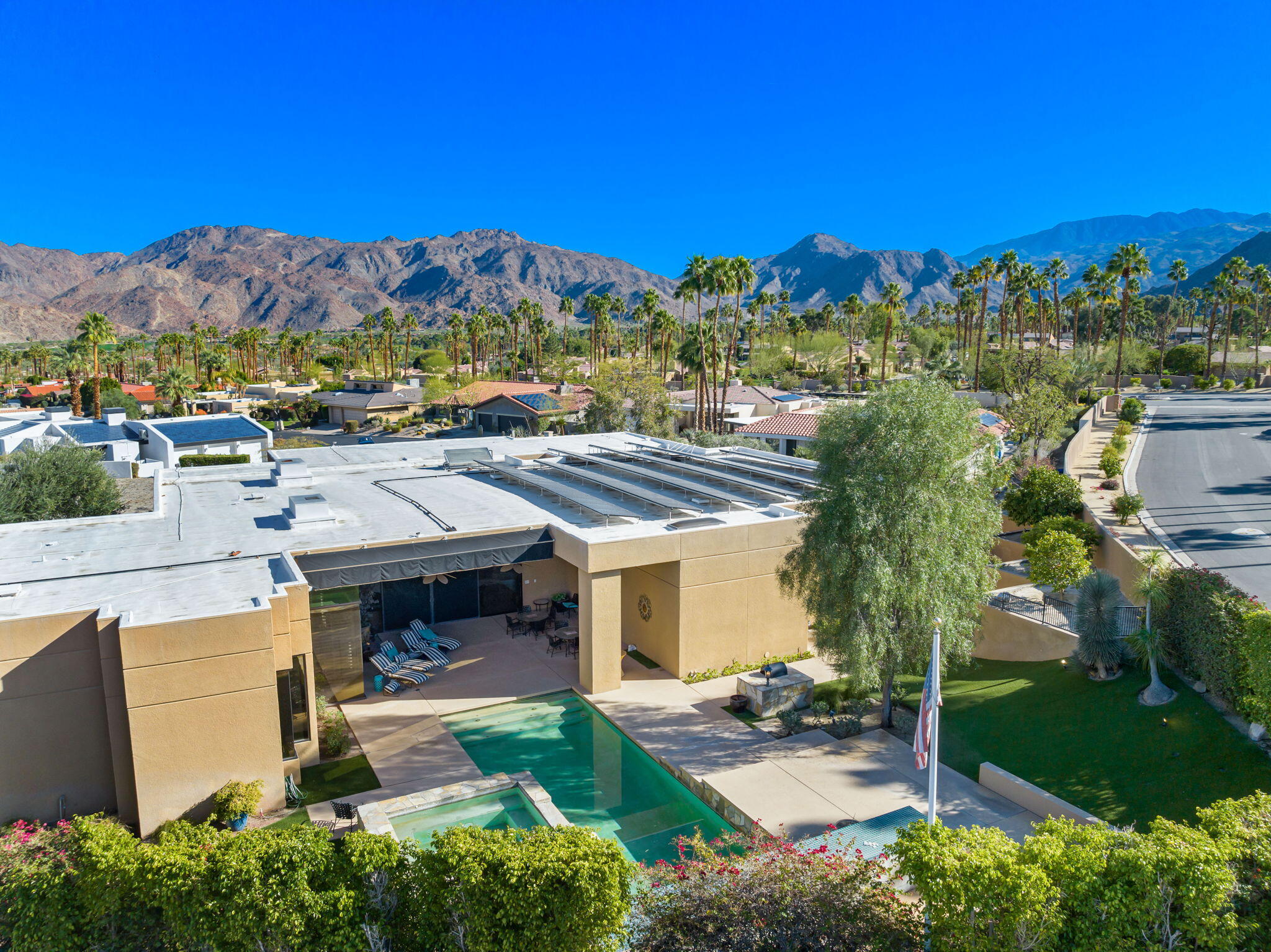 73380 Agave Lane Palm Desert, CA 92260 - Photo 71 of 81 an aerial view of a house with a yard and lake view